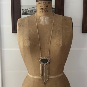 Kendra Scott stone and gold long necklace.